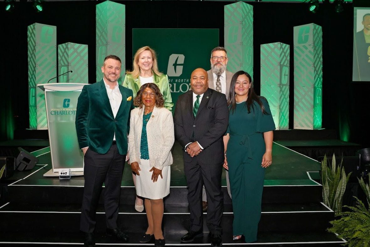 Group of people posing at alumni awards
