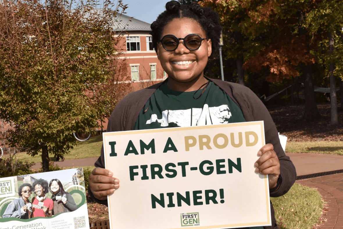 Student Holding First Gen Sign